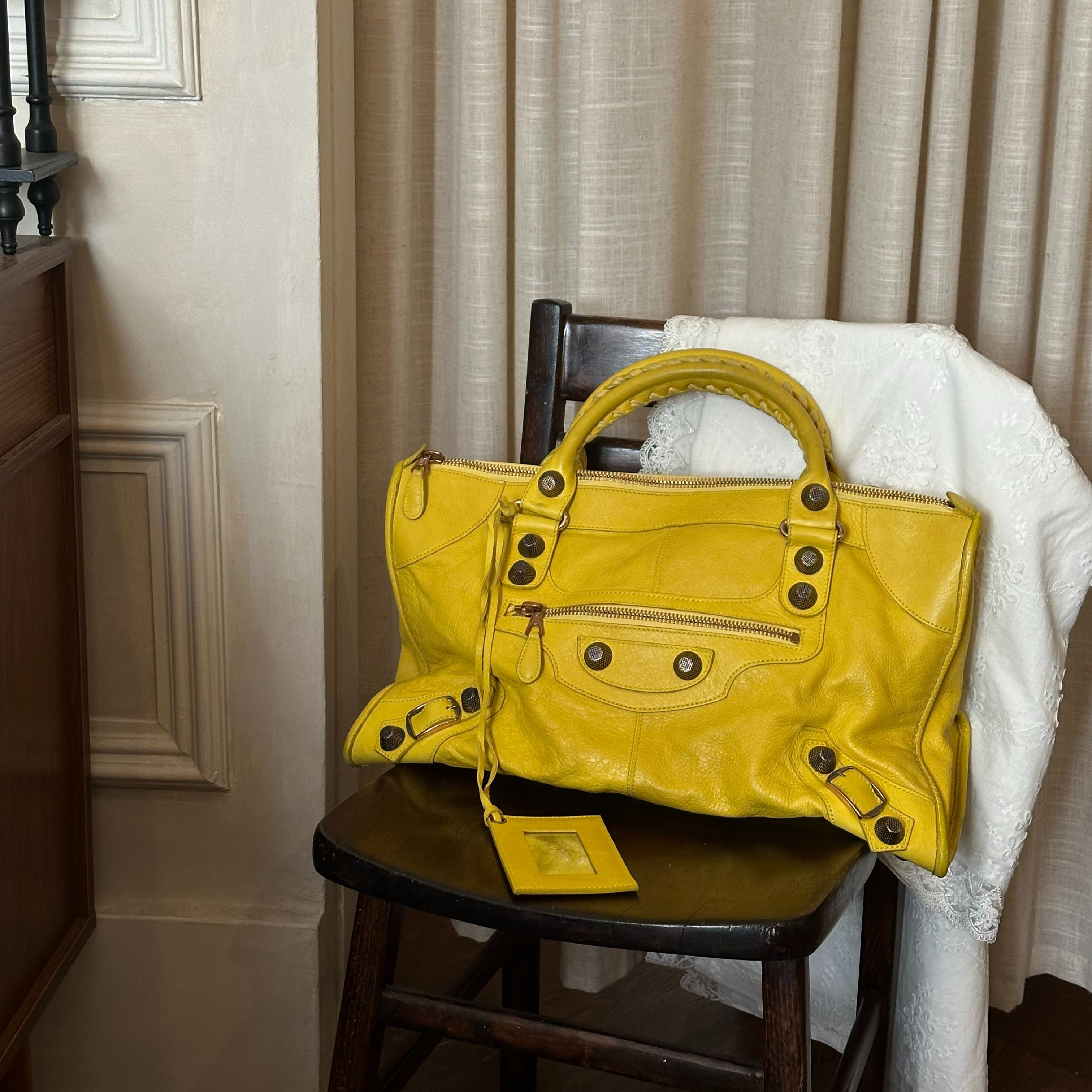 B Yellow studded motorcycle bag
