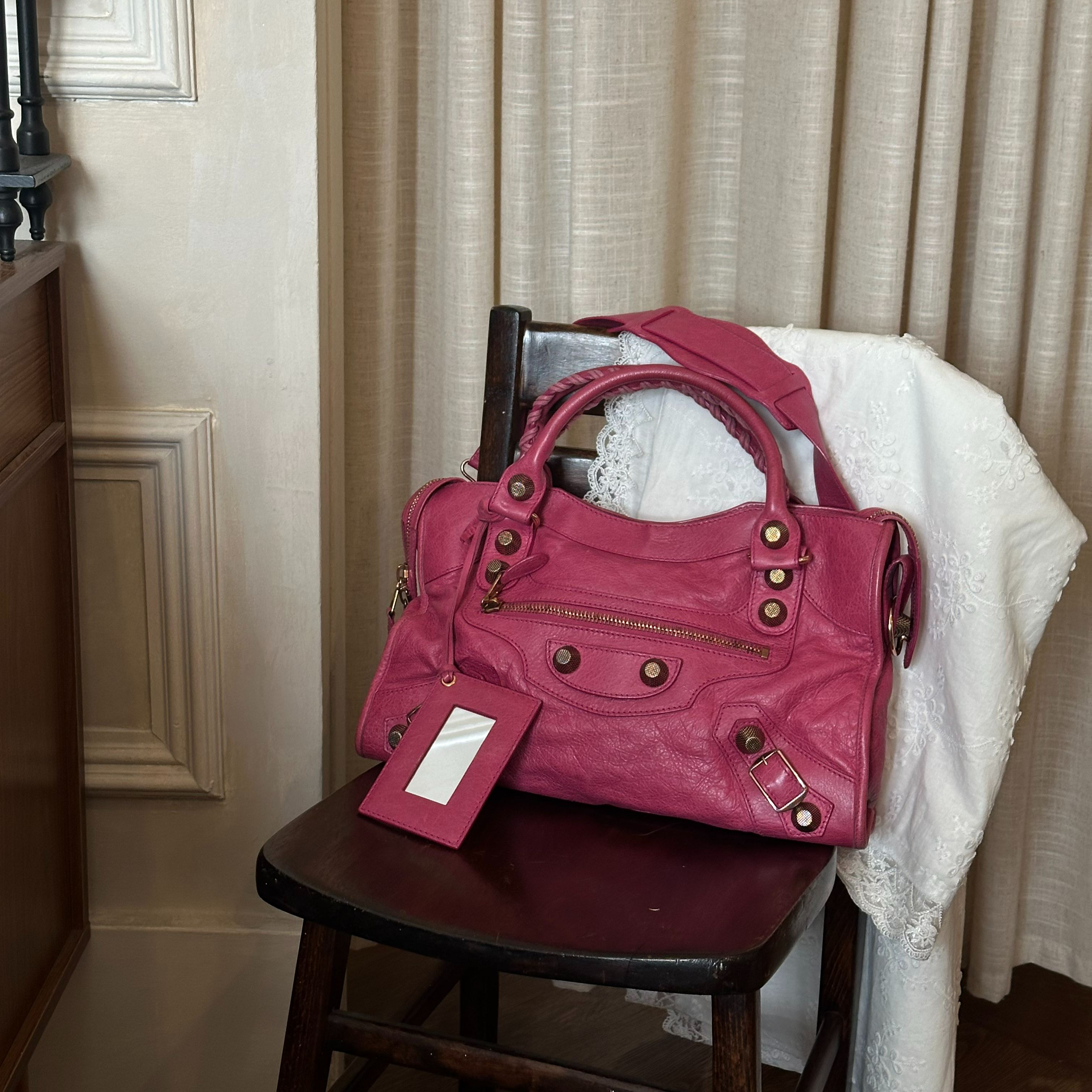 B Magenta studded motorcycle bag