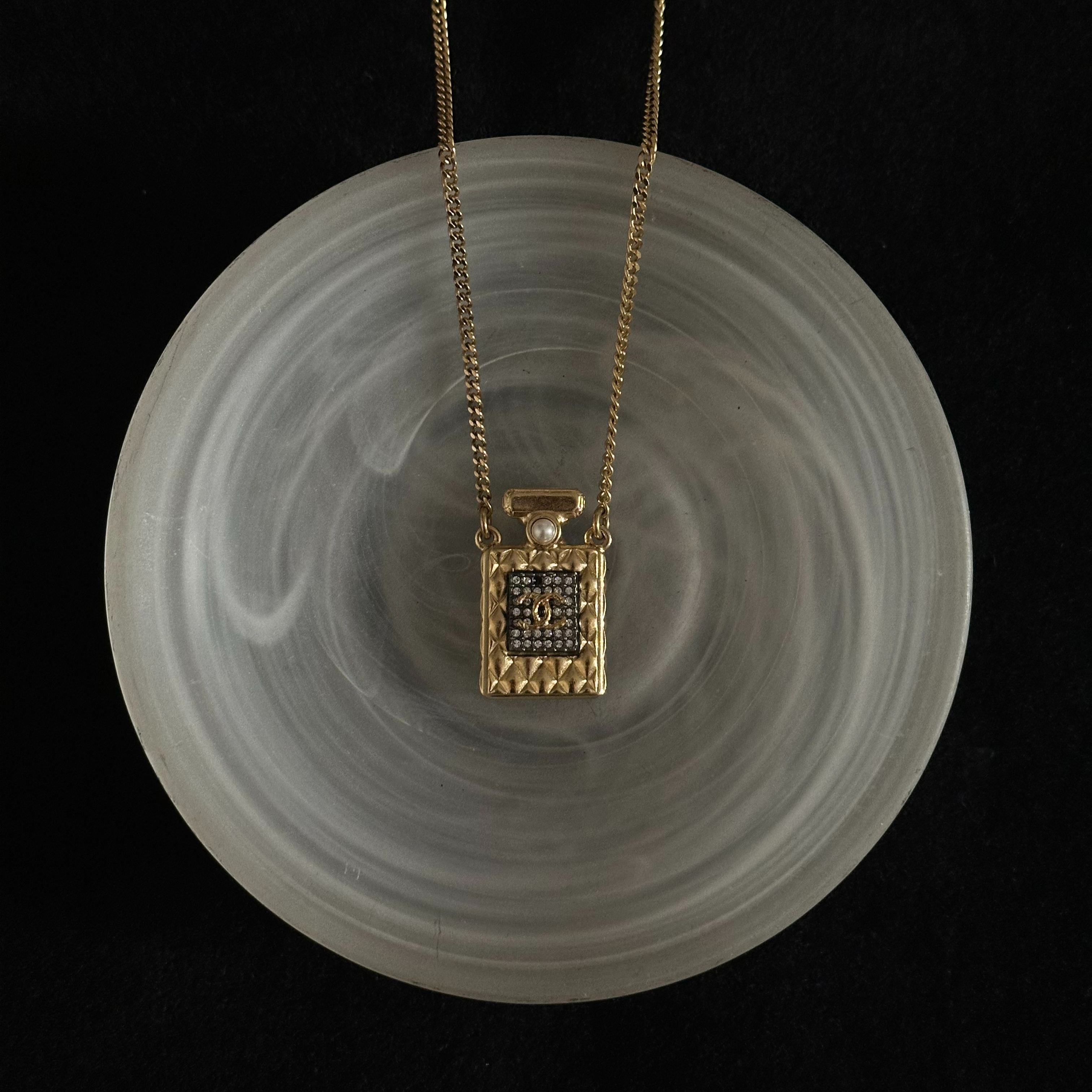 C Perfume bottle necklace
