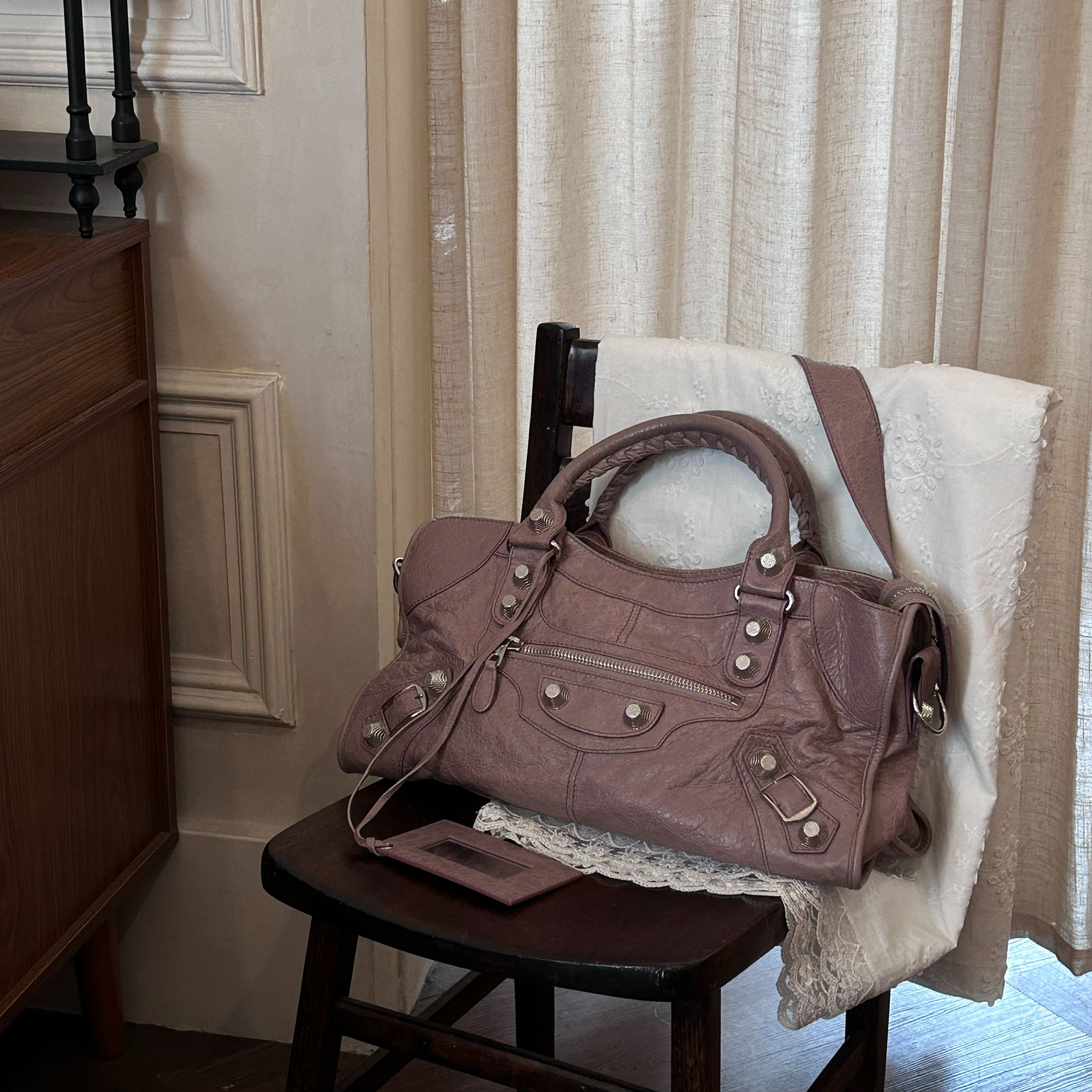 B Purple studded motorcycle bag