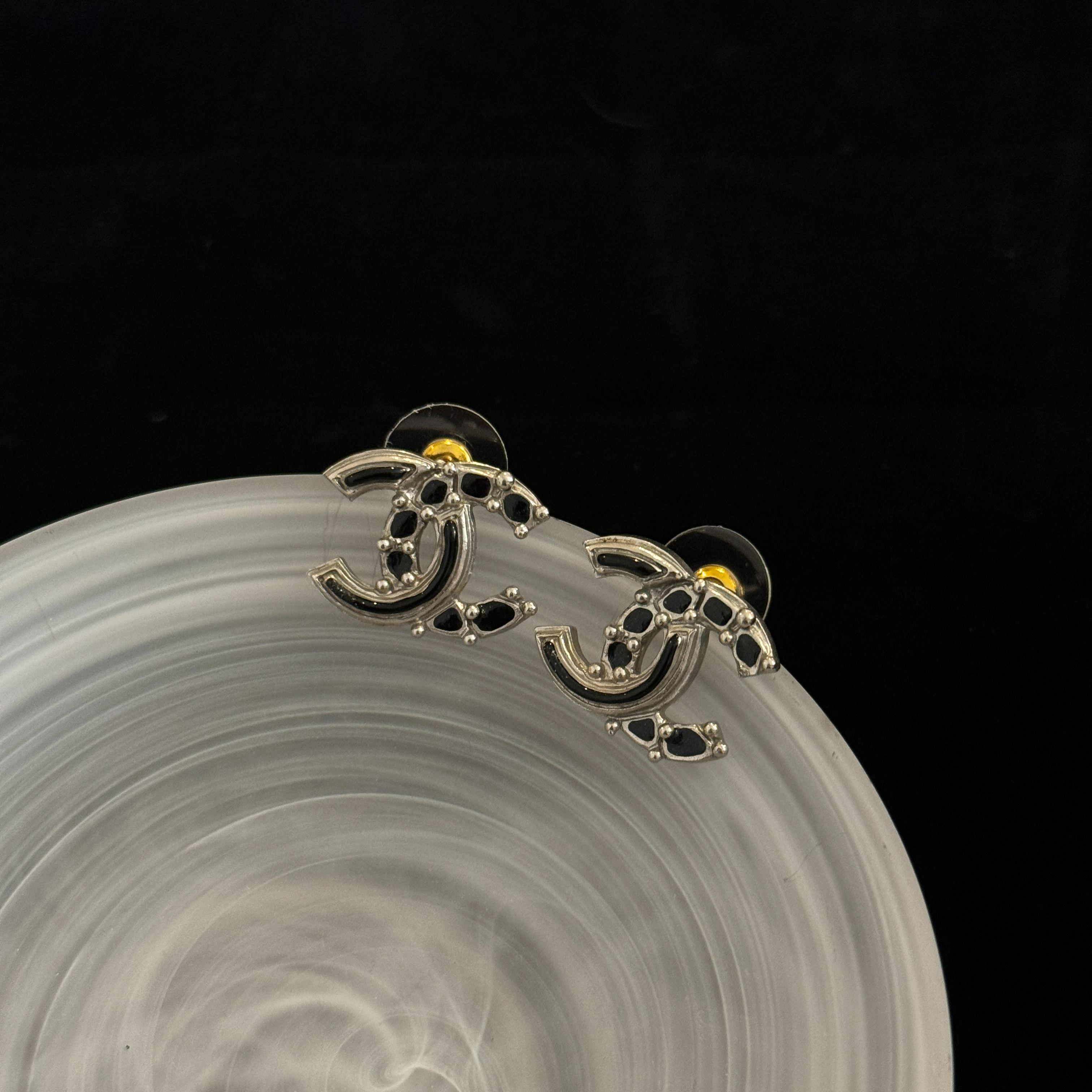 C Double C enamel earrings