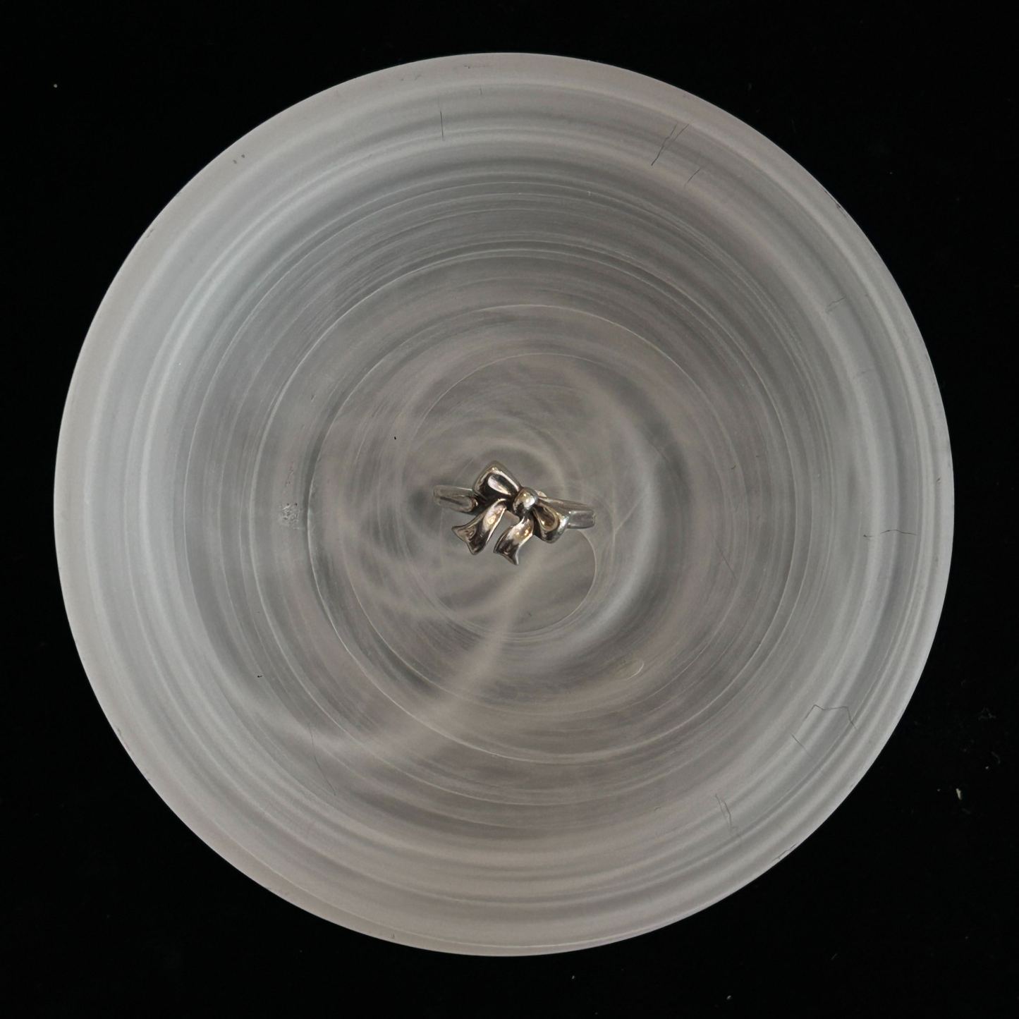 T Bow ring