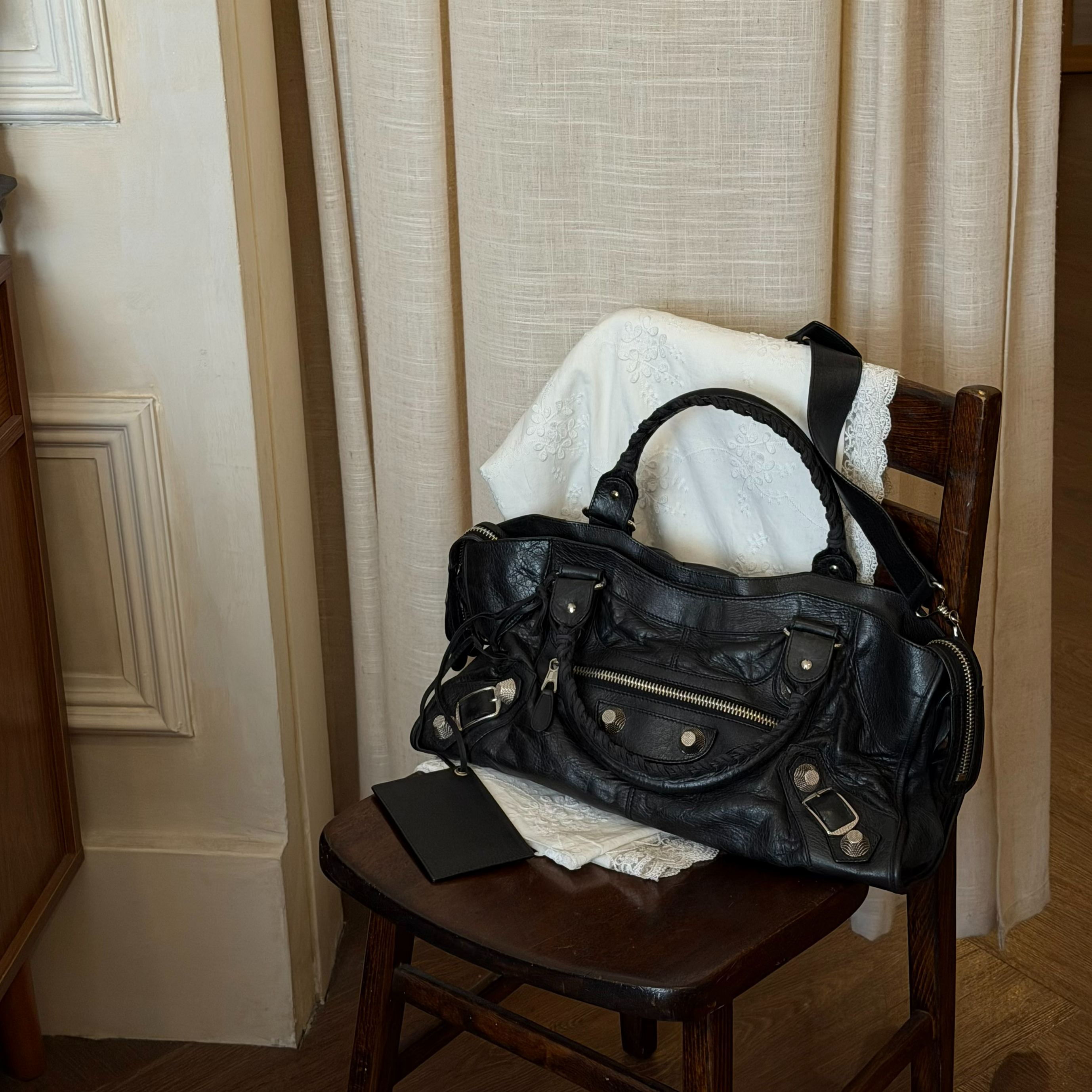 B Black and silver studded motorcycle bag