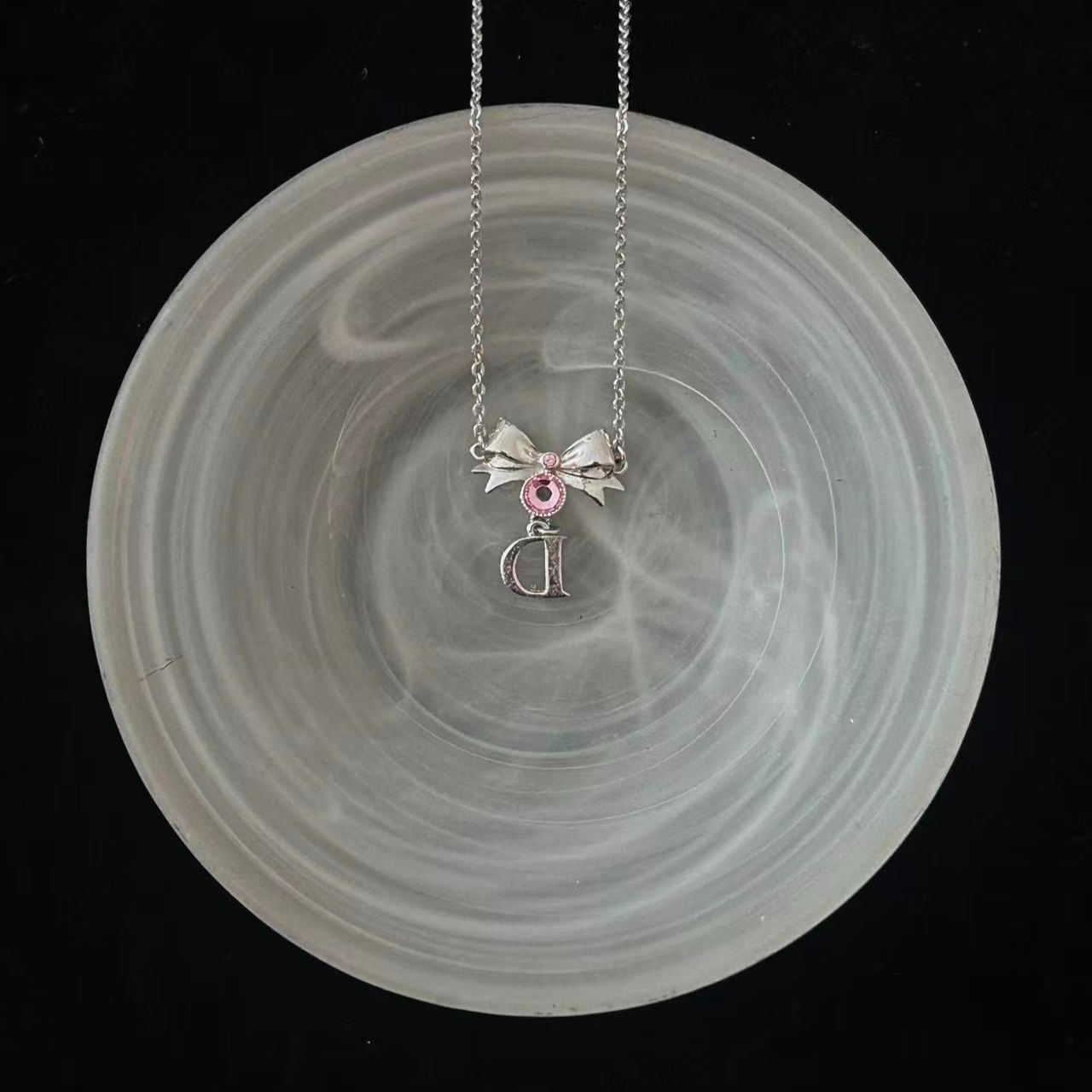 D Bow logo pendant pink necklace