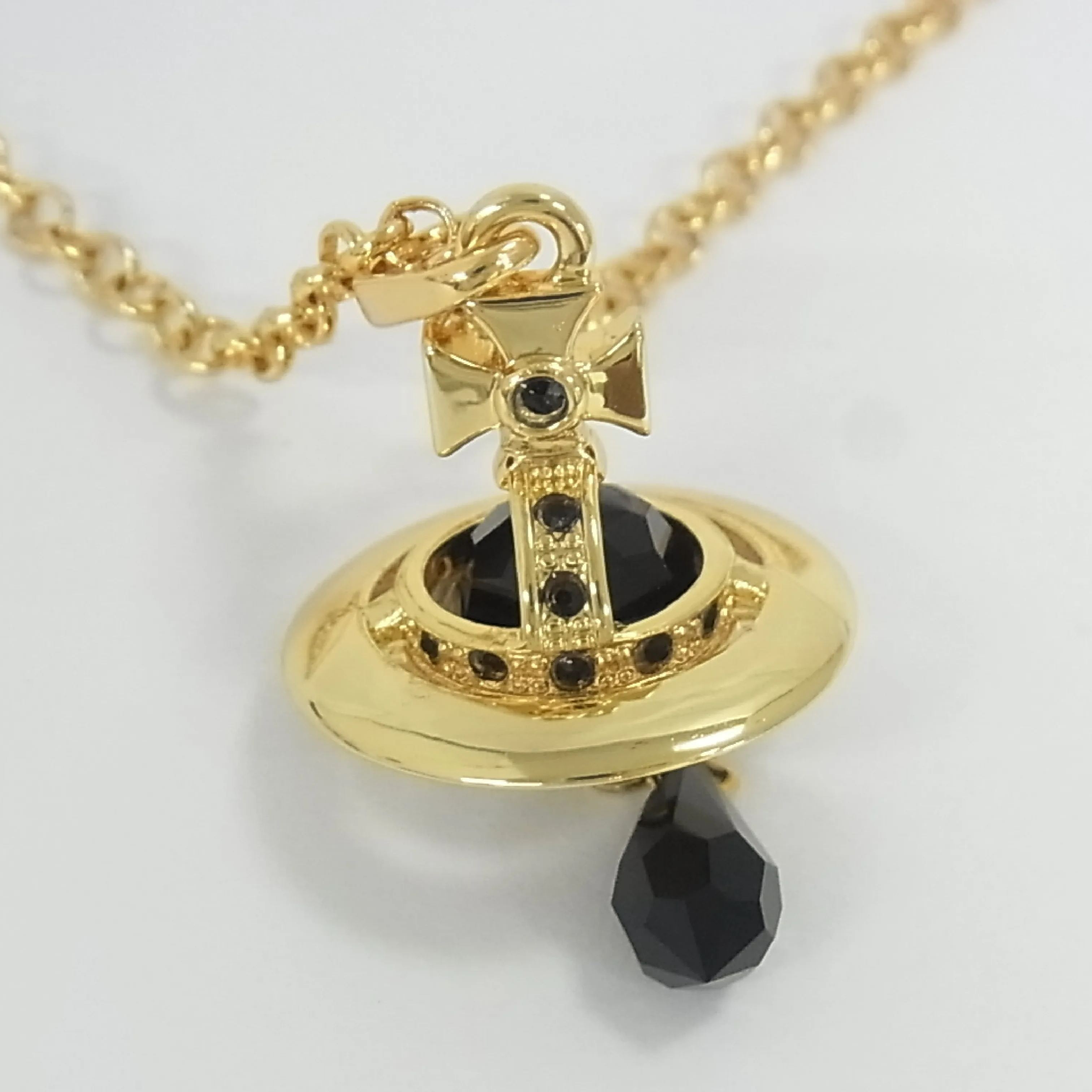 V Gold 3D Saturn orb necklace