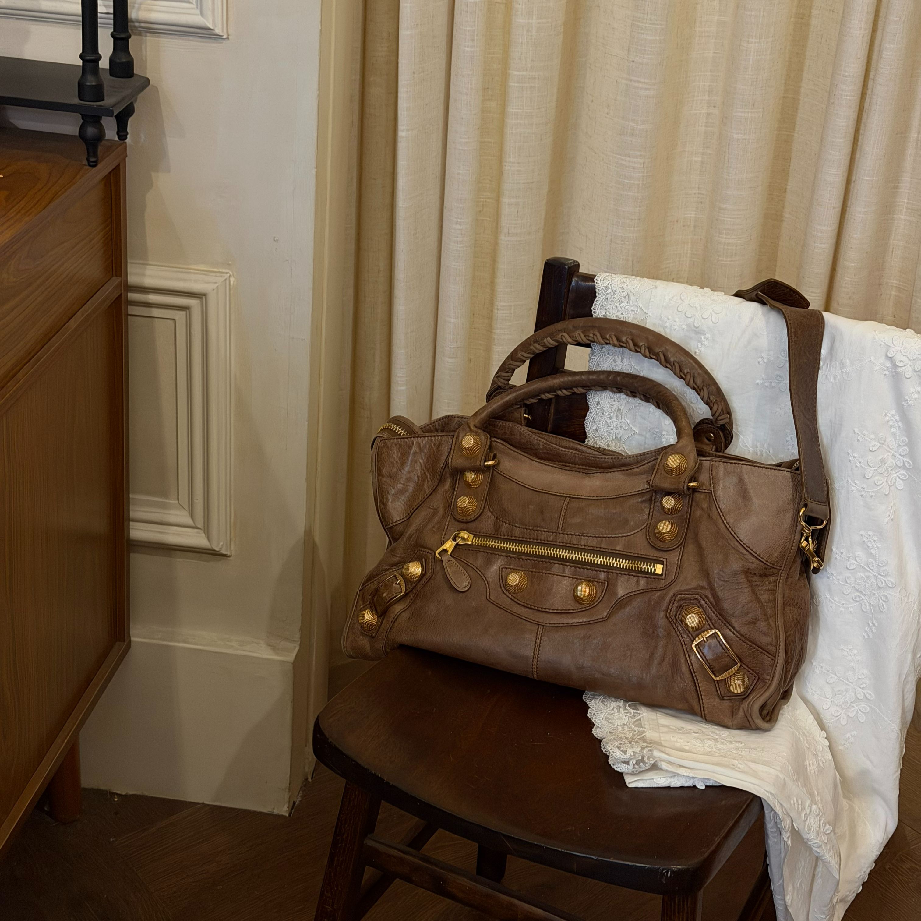B Brown studded motorcycle bag