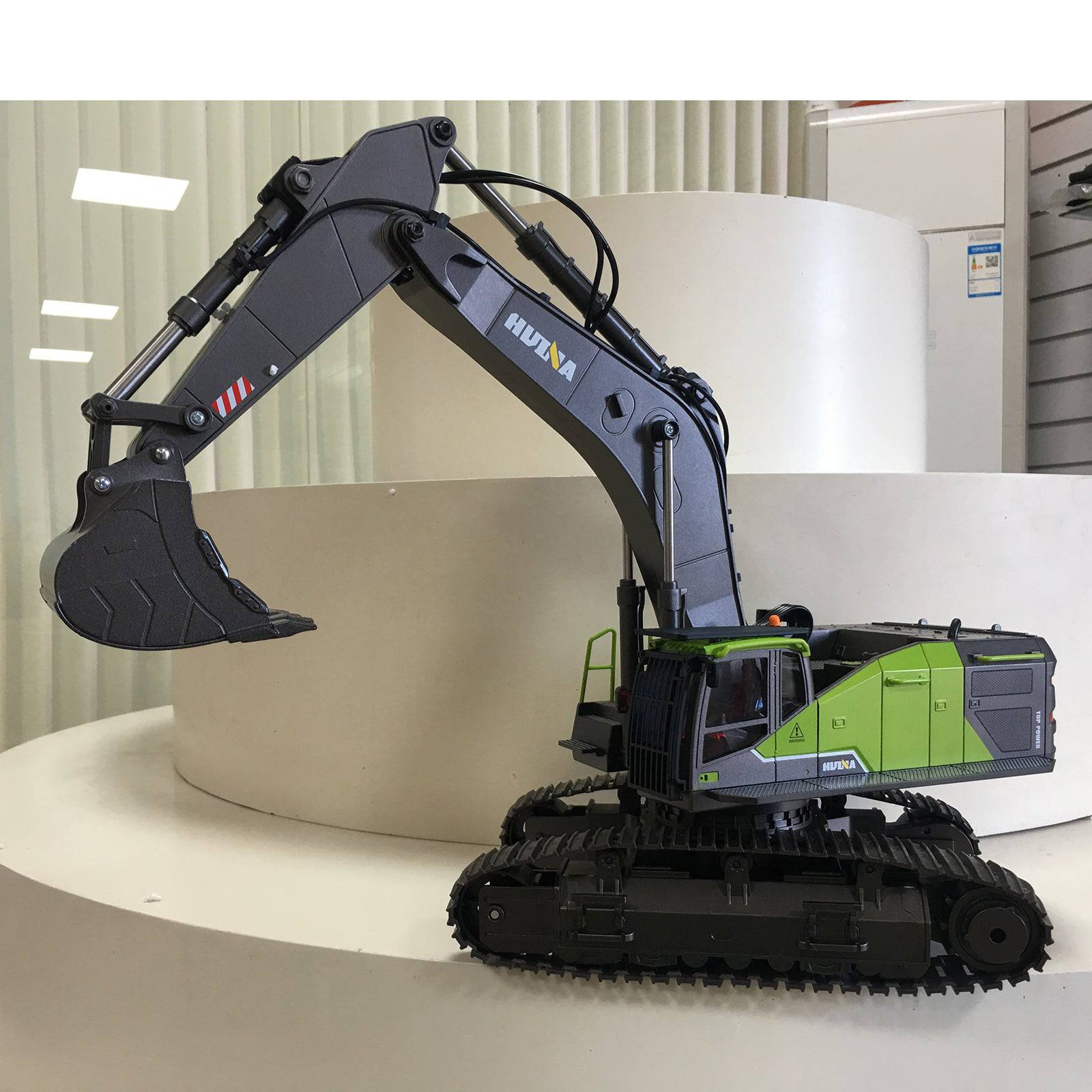 Huina 4-in-1 1/14 Scale 22CH RC Excavator with Metal Attachments RTR Construction Vehicle