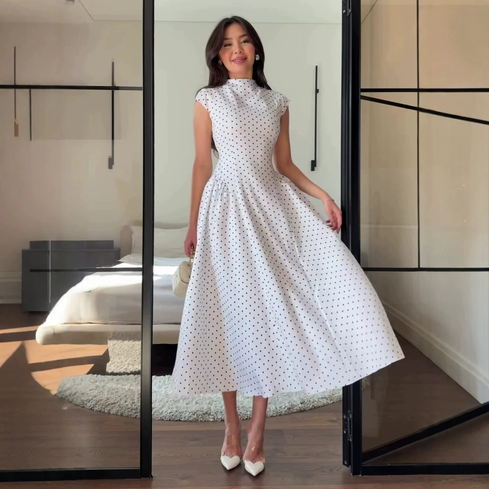 Round neck sleeveless waist tie and elegant polka dot dress