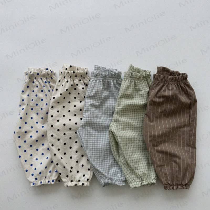 Pantaloni a quadri con fiori e pois a forma di pomodoro per bambini - image 2