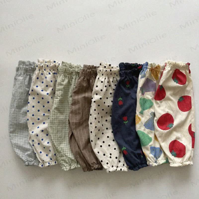 Pantaloni a quadri con fiori e pois a forma di pomodoro per bambini - image 1