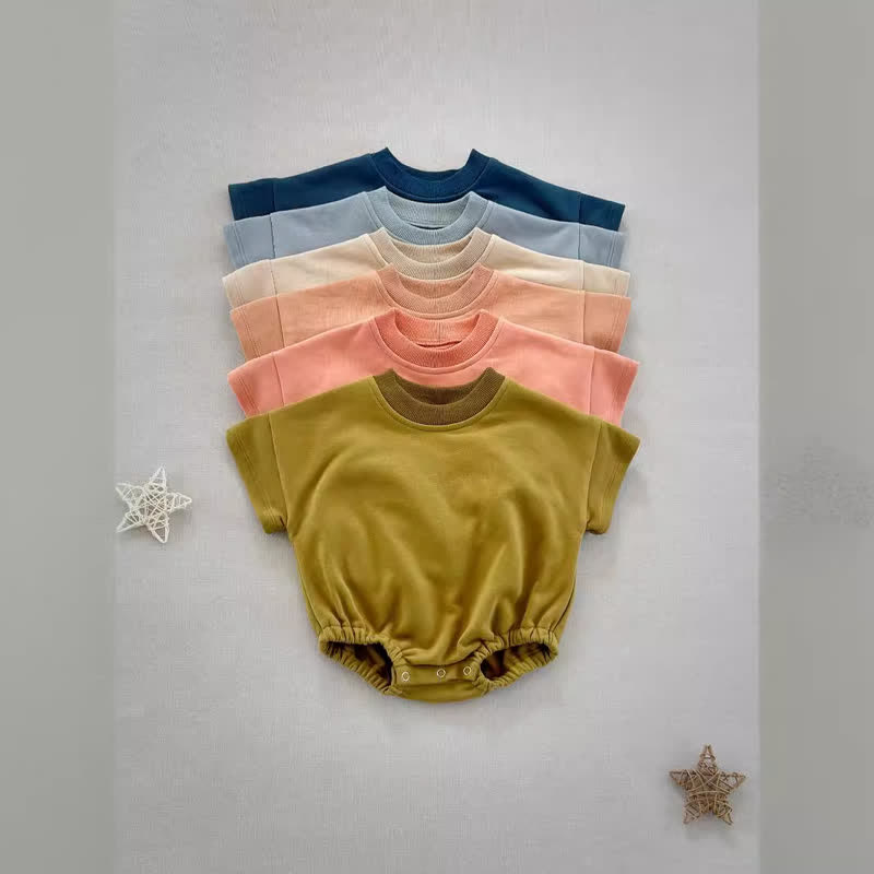 Tutina comoda e comoda in tinta unita per neonati - image 3