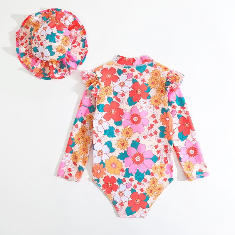 Costume intero da bagno a fantasia floreale per bambina con cappellino incluso. - image 7