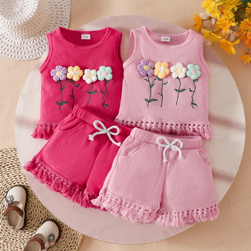 Set 2 pezzi per neonato con nappe e fiori 3D senza maniche - image 1