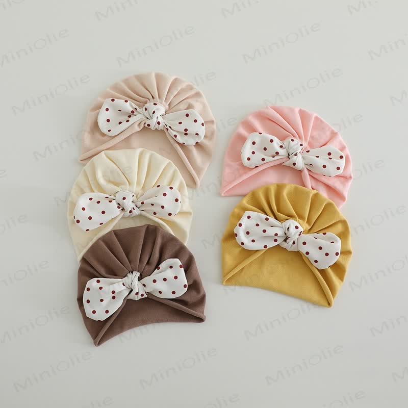 Cappello con fiocco a pois per neonato - image 1