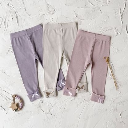 Leggings tinta unita con fiocco per bambina - image 1