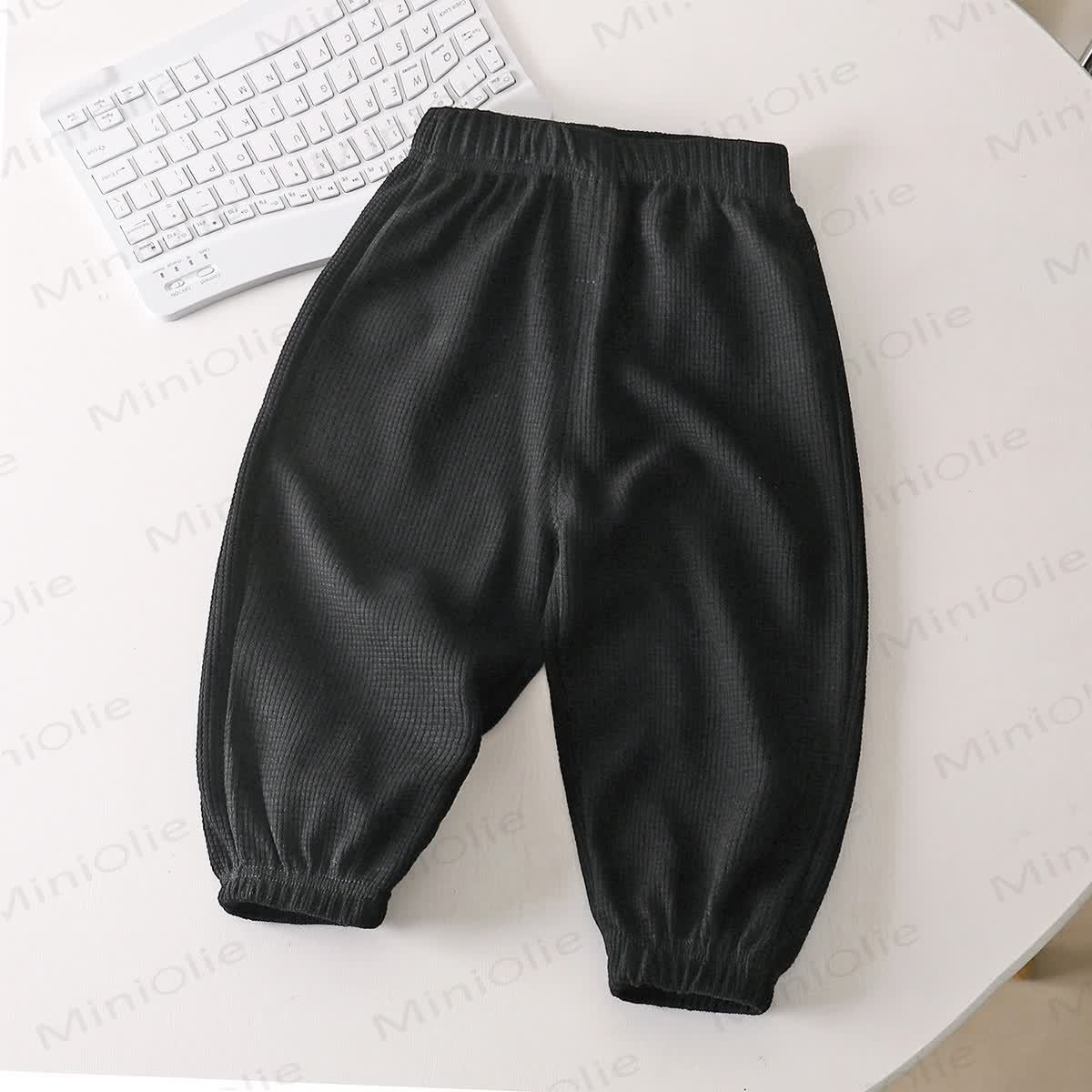 Pantaloni a tinta unita a nido d'ape per neonati e bambini piccoli - Nero - 6-7T - image 2