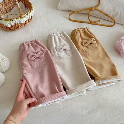 Pantaloni foderati in pile con fiocco in velluto a coste per neonati e bambine - image 1