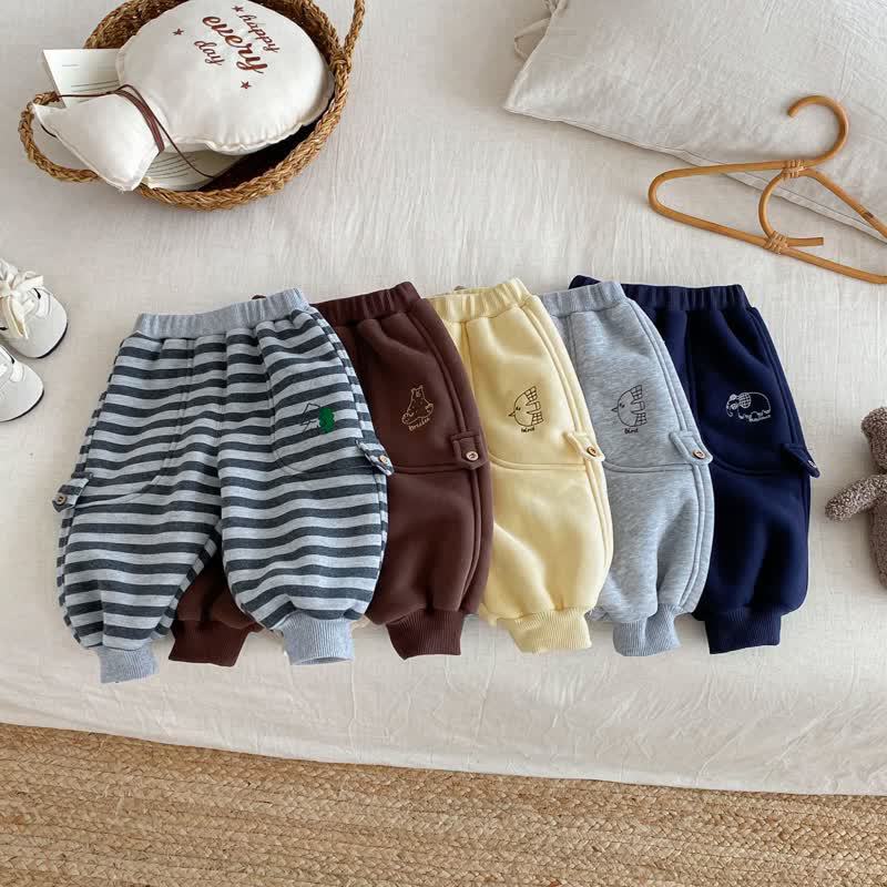 Pantaloni da jogging foderati in pile con motivo animali per neonati e bambini - image 1