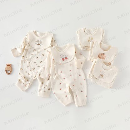 Tutina per neonato beige con stampa a cartoni animati - image 1