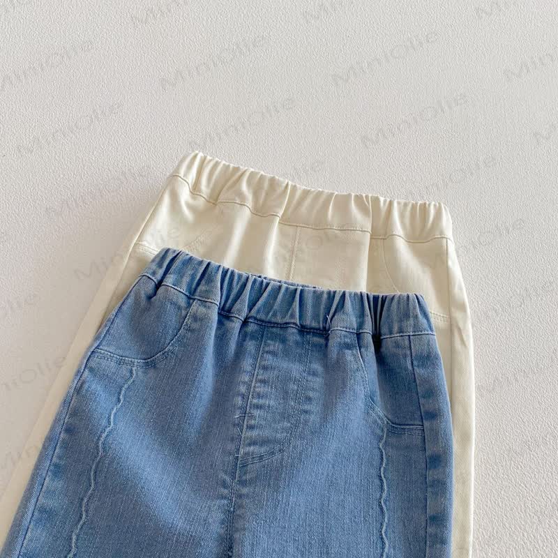 Pantaloni in denim tinta unita con fiocco per bambina - image 5