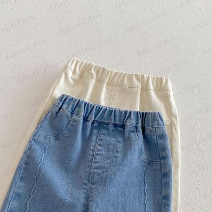 Pantaloni in denim tinta unita con fiocco per bambina - image 5