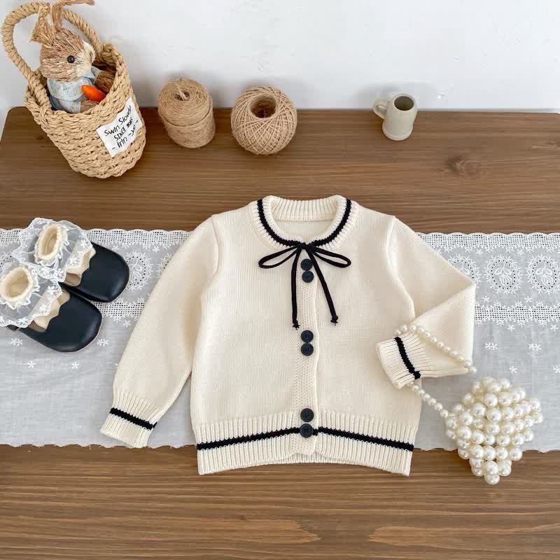 Cardigan con fiocco in maglia per bambina/pantaloni neri/pantaloni a righe - image 5