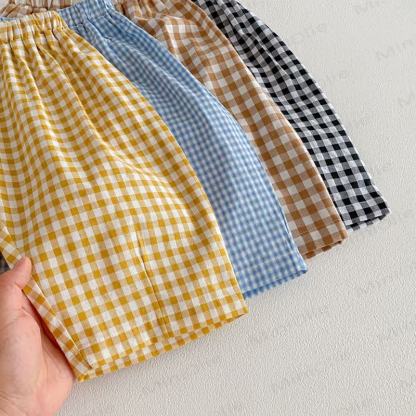 Pantaloni a quadri per neonati e bambini - image 2