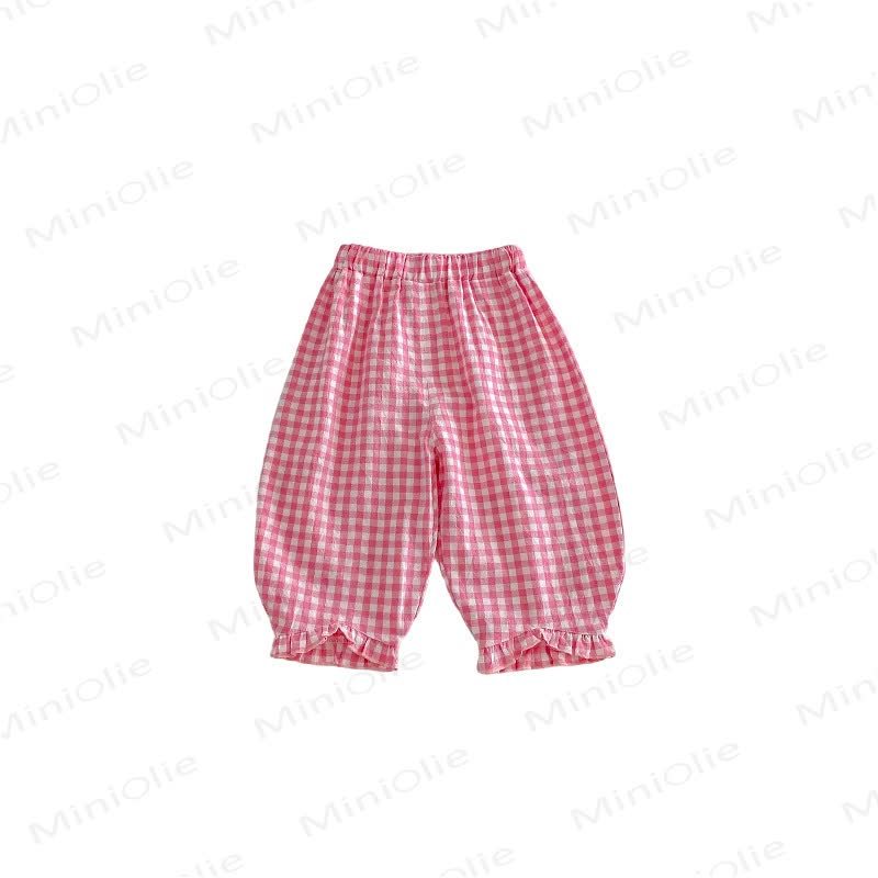 Pantaloni a quadri per bambina - image 5