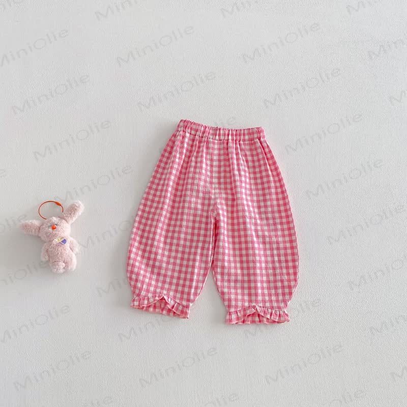 Pantaloni a quadri per bambina - Plaid bianco rosa - 5-7T - image 6