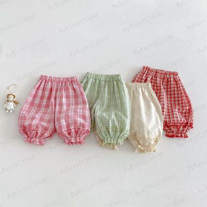 Pantaloni a quadri per bambina - image 1