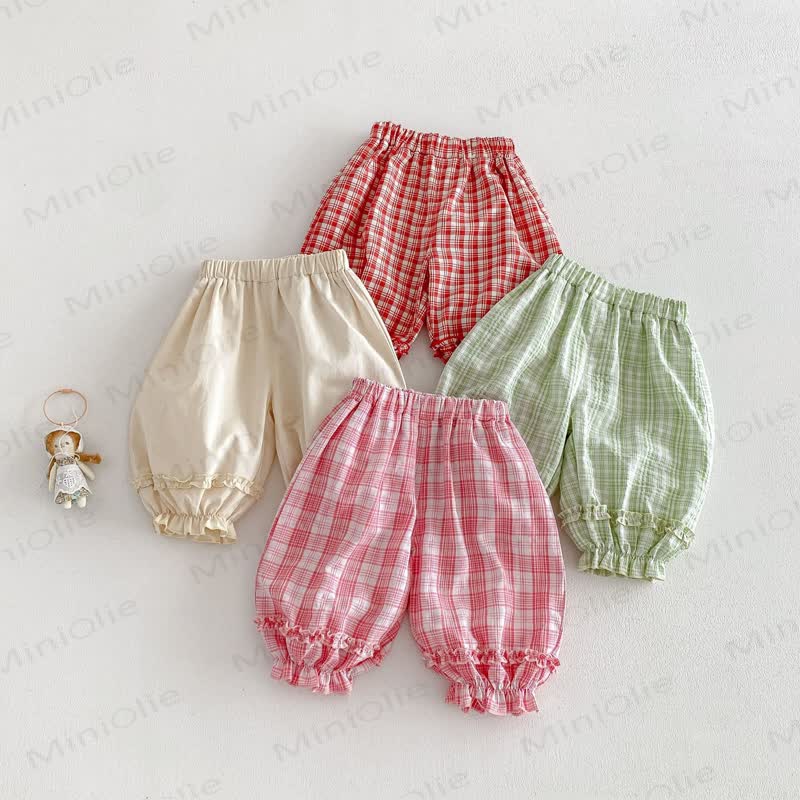 Pantaloni a quadri per bambina - image 2