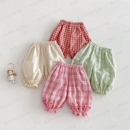 Pantaloni a quadri per bambina - image 2
