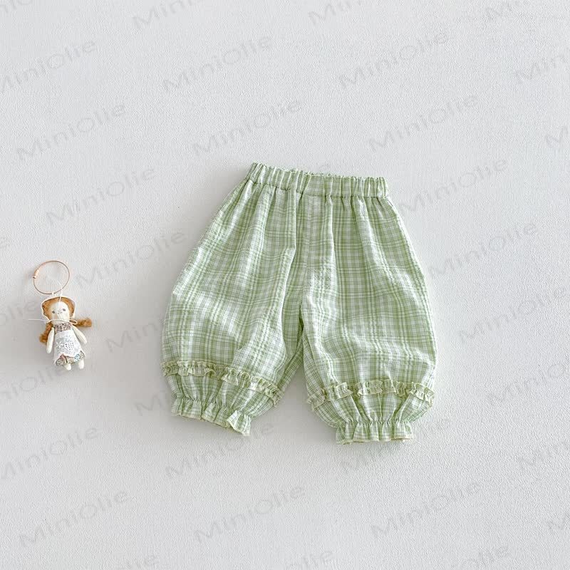 Pantaloni a quadri per bambina - Plaid bianco verde - 5-7T - image 6