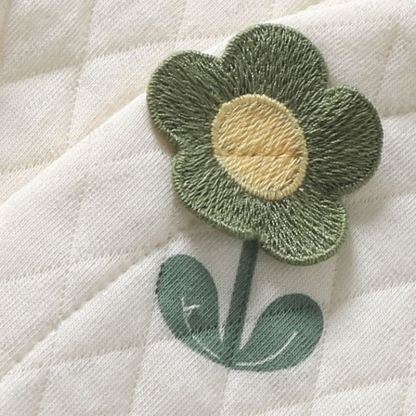 Tutina beige con fiori 3D per neonati - image 3