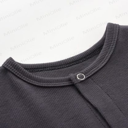 Tutina a coste tinta unita per neonati con piedini - image 4