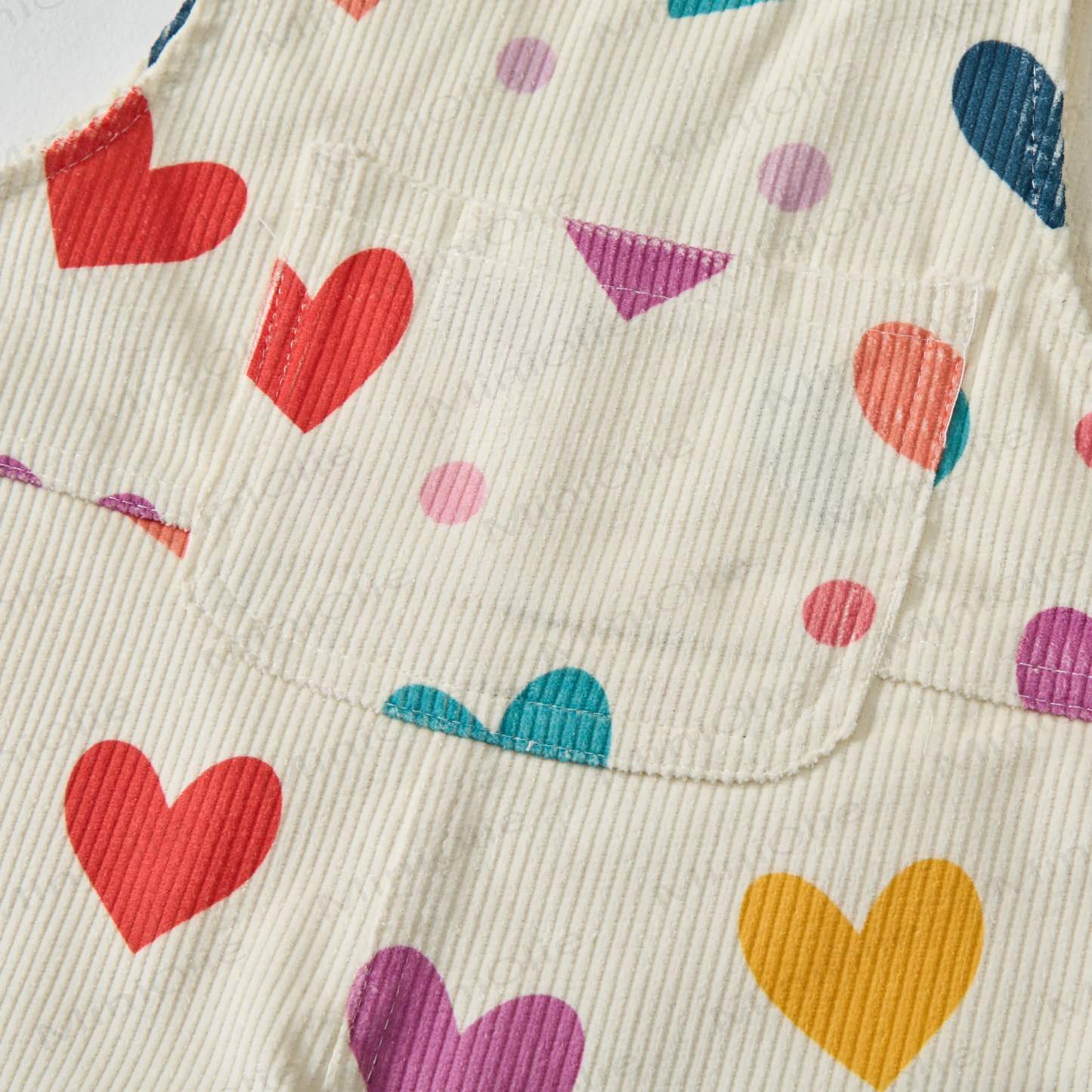 Salopette in velluto a coste beige con cuori colorati e pois per neonati e bambini - image 4