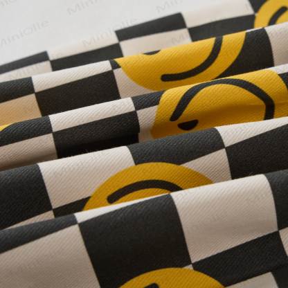 Tuta bianca con faccina sorridente e motivo a scacchi per neonati e bambini - image 4