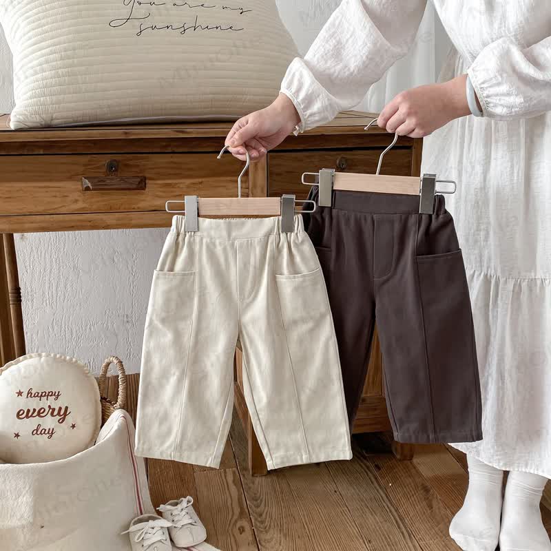 Pantaloni a tinta unita con tasche per bambini - image 1