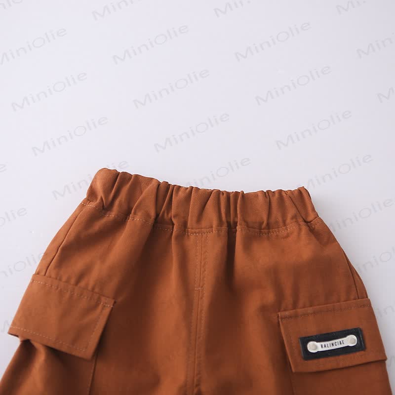 Completo per bambino composto da maglietta a righe con taschino e pantaloncini. - image 12