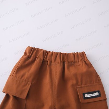 Completo per bambino composto da maglietta a righe con taschino e pantaloncini. - image 12