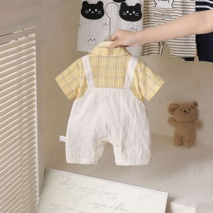 Completo per neonato a due pezzi con stampa a quadri e motivo paperella. - image 2