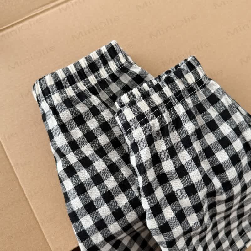 Completo per bambini LITTLE DINO composto da maglietta e pantaloncini a quadri. - image 11