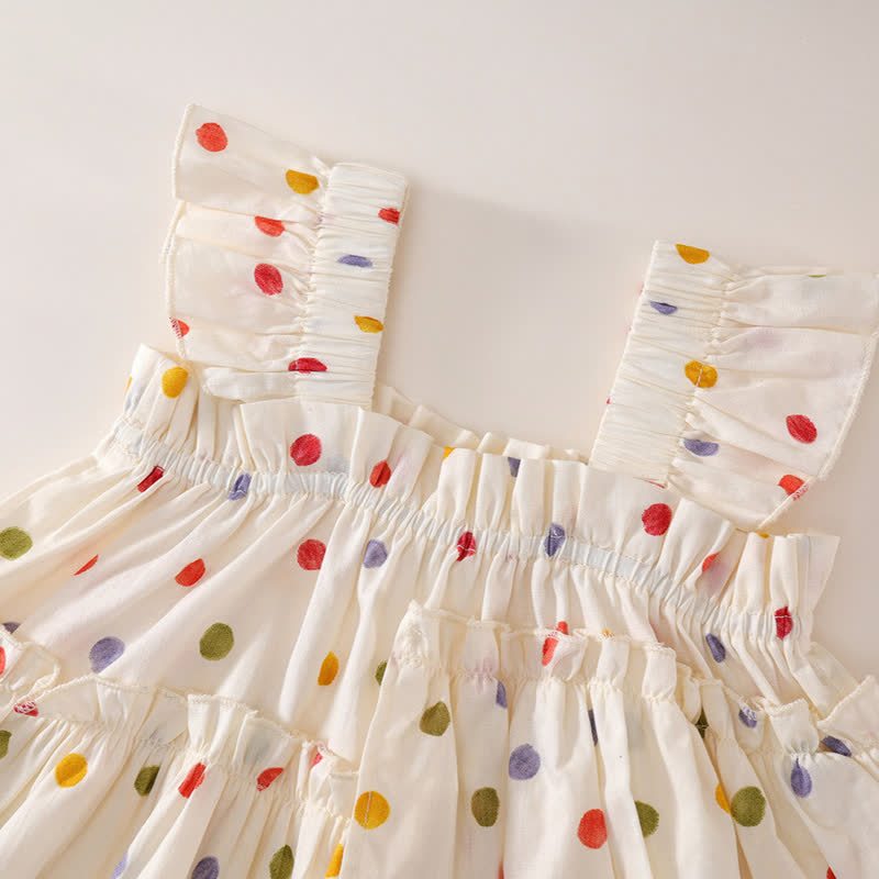 Completo da bambina con top e pantaloni beige a pois. - image 2