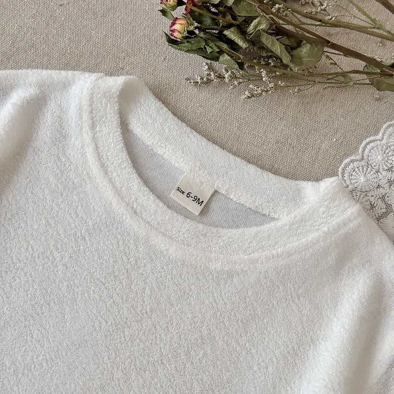 Completo baby in spugna con top corto e pantaloncini a quadri. - image 2