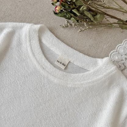 Completo baby in spugna con top corto e pantaloncini a quadri. - image 2