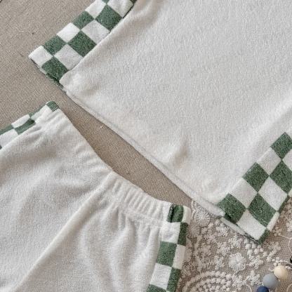 Completo baby in spugna con top corto e pantaloncini a quadri. - image 3