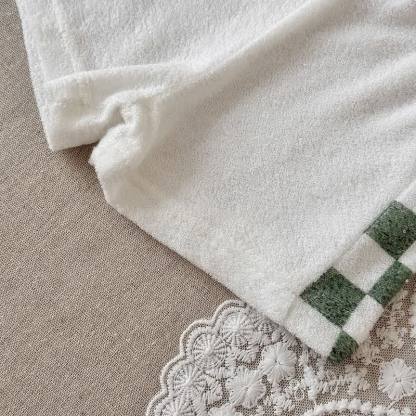 Completo baby in spugna con top corto e pantaloncini a quadri. - image 4