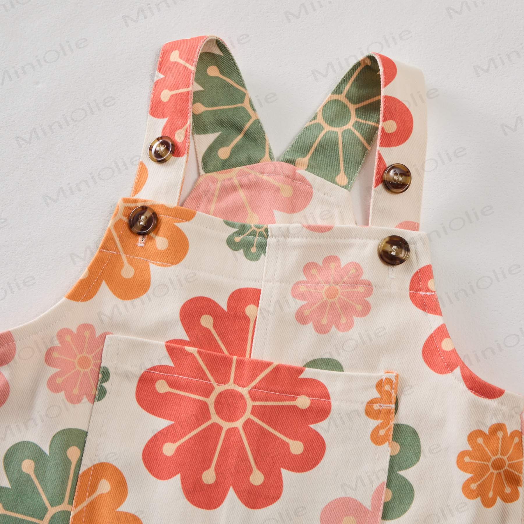 Salopette con tasche a fiori per neonati e bambini - image 3