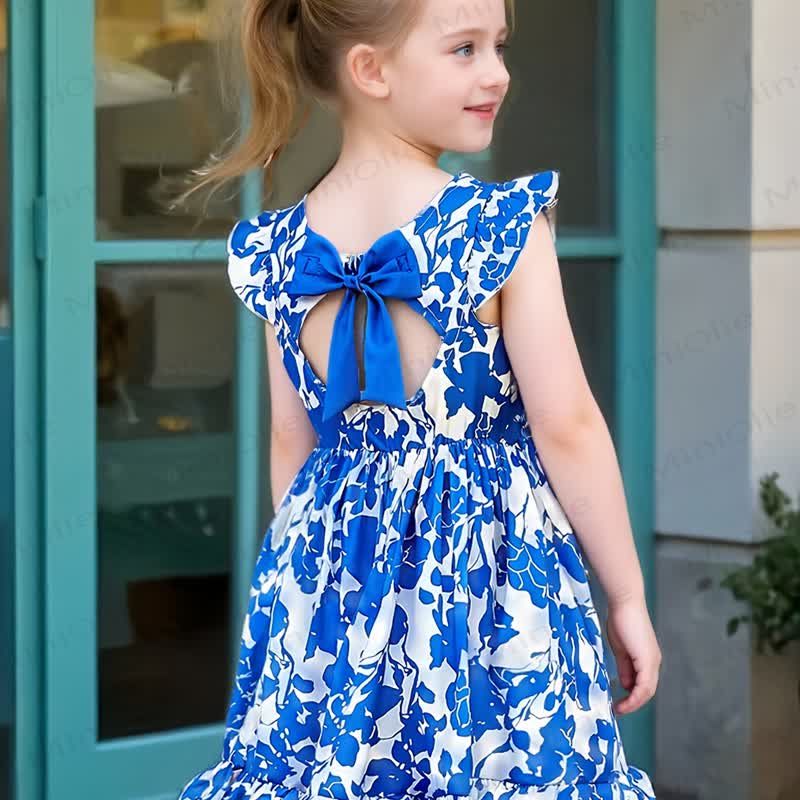 Vestito a trapezio primaverile da bambina con stampa floreale, volant e fiocco. - image 4