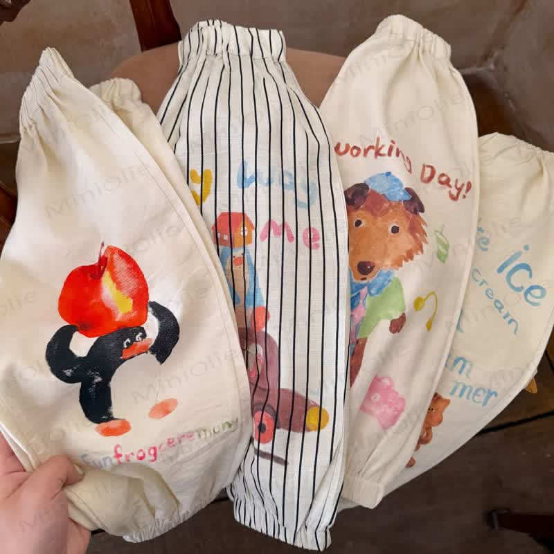 Pantaloni casual in cotone per bambini con stampa a righe e motivo di cibo di animali. - image 1